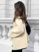 Abrigo largo de piel sintética con cuello redondo