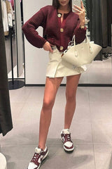 Suéter de punto de color liso